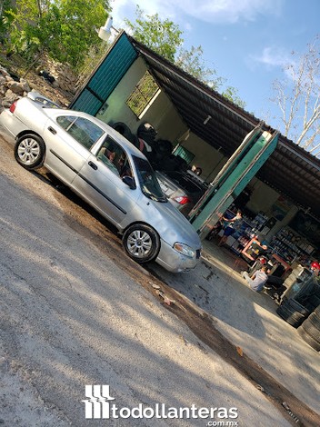 Lavadero y llantera tomy